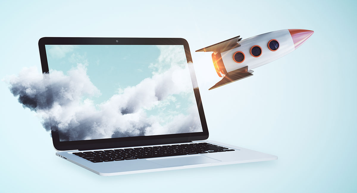 A rocket launching from a laptop; speed up your website today!