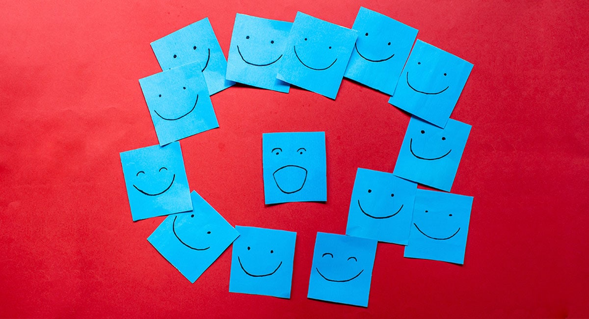 Blue sticky notes with faces
