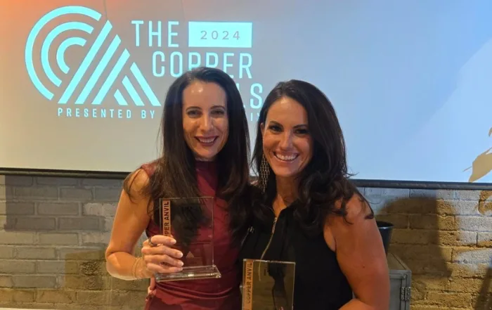 Andrea Aker and Lauren Garstecki at the PRSA Copper Anvil Awards